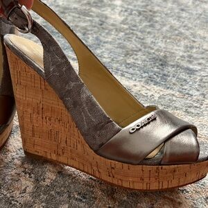 gently worn metallic silver coach wedge sandals.  size 7